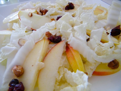 Napa cabbage salad with fruits and nuts
