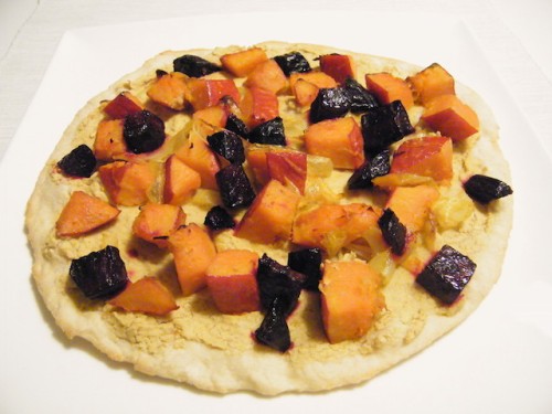 hummus pizza with beet root and pumpkin